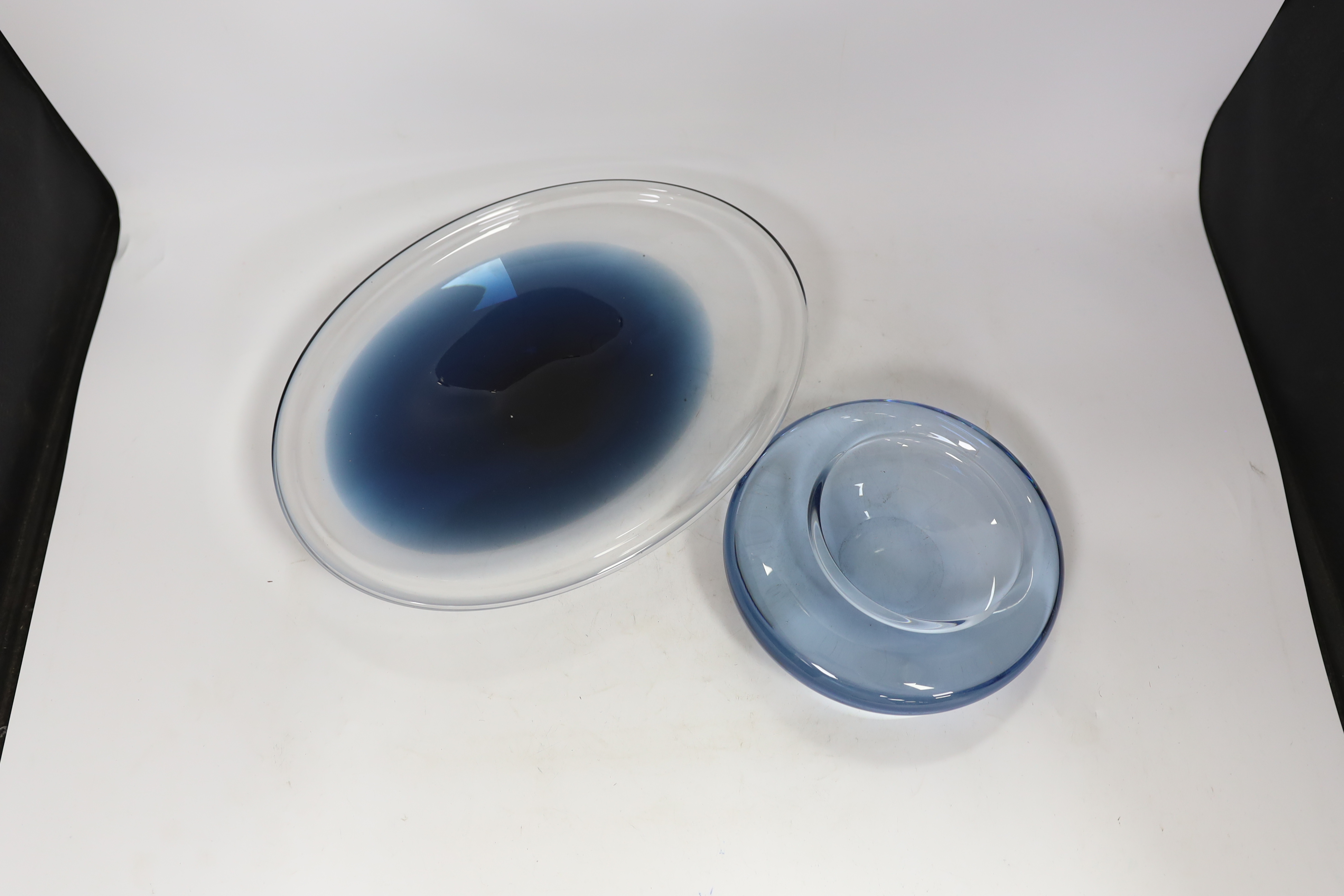 Two 1960's glass dishes, a Per Lutken for Holmegaard example and a Wedgwood example, both signed, largest 33.5cm